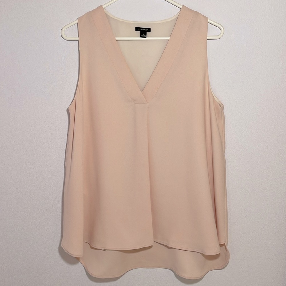 Ann Taylor soft pink flowing, front pleat, sleeveless  top. Size small.